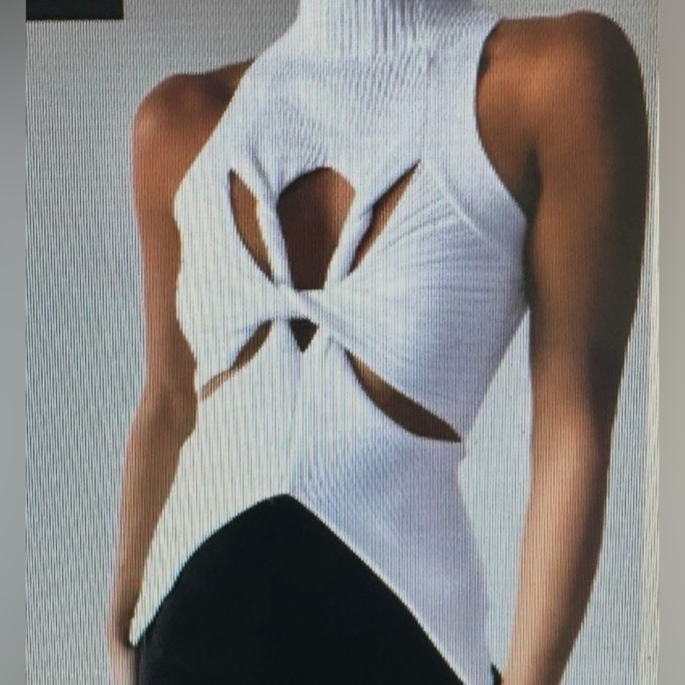 Commences- Black Sleeveless twisted Knit Top
(white photo to show detail)